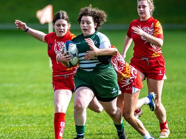 Girls playing rugby