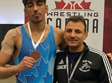 student wrestler in singlet