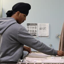 Internship student preparing heating pads for patients
